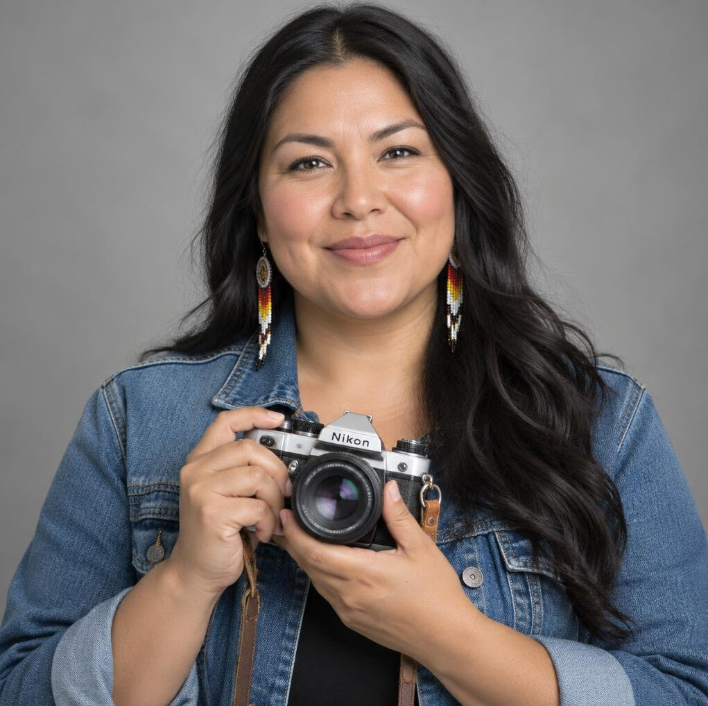 Portrait of an Indigenous Canadian woman photographer smiling